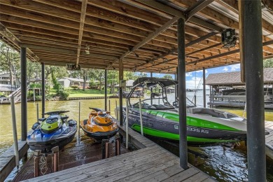 This beautifully remodeled lakehouse, completed in 2021, is a on Cedar Creek Country Club in Texas - for sale on GolfHomes.com, golf home, golf lot