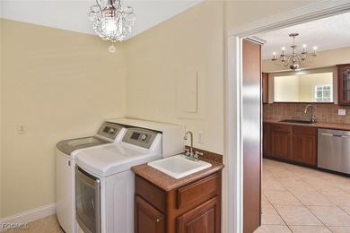 Welcome to luxury lakefront living in the heart of Stratford on Cypress Lake Country Club in Florida - for sale on GolfHomes.com, golf home, golf lot