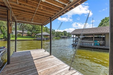 This beautifully remodeled lakehouse, completed in 2021, is a on Cedar Creek Country Club in Texas - for sale on GolfHomes.com, golf home, golf lot