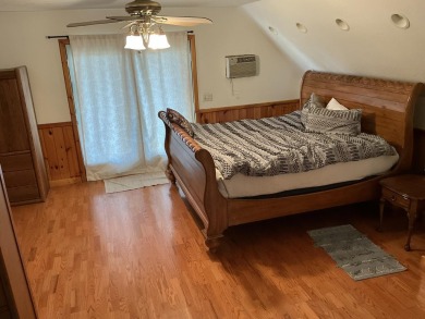Experience luxury and serenity with this beautifully appointed 3 on Eagle Ridge Golf Course in Michigan - for sale on GolfHomes.com, golf home, golf lot