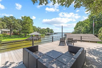 This beautifully remodeled lakehouse, completed in 2021, is a on Cedar Creek Country Club in Texas - for sale on GolfHomes.com, golf home, golf lot