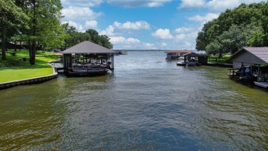 This beautifully remodeled lakehouse, completed in 2021, is a on Cedar Creek Country Club in Texas - for sale on GolfHomes.com, golf home, golf lot