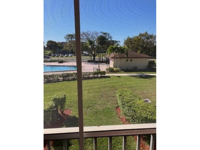 CHARMING 2BR 1.5 BA APARTMENT WITH RELAXING POOL & GARDEN VIEW on Flamingo Lakes Country Club in Florida - for sale on GolfHomes.com, golf home, golf lot