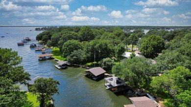 This beautifully remodeled lakehouse, completed in 2021, is a on Cedar Creek Country Club in Texas - for sale on GolfHomes.com, golf home, golf lot