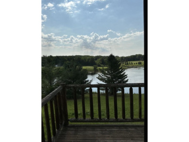 Experience luxury and serenity with this beautifully appointed 3 on Eagle Ridge Golf Course in Michigan - for sale on GolfHomes.com, golf home, golf lot