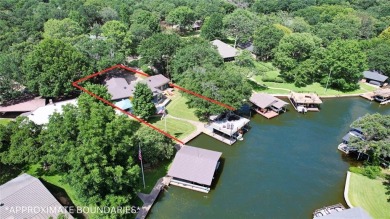 This beautifully remodeled lakehouse, completed in 2021, is a on Cedar Creek Country Club in Texas - for sale on GolfHomes.com, golf home, golf lot