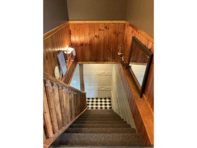 Experience luxury and serenity with this beautifully appointed 3 on Eagle Ridge Golf Course in Michigan - for sale on GolfHomes.com, golf home, golf lot