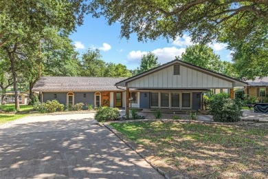 This beautifully remodeled lakehouse, completed in 2021, is a on Cedar Creek Country Club in Texas - for sale on GolfHomes.com, golf home, golf lot