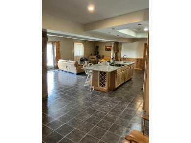 Experience luxury and serenity with this beautifully appointed 3 on Eagle Ridge Golf Course in Michigan - for sale on GolfHomes.com, golf home, golf lot