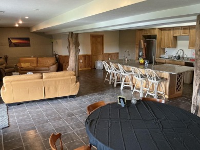 Experience luxury and serenity with this beautifully appointed 3 on Eagle Ridge Golf Course in Michigan - for sale on GolfHomes.com, golf home, golf lot