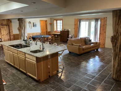 Experience luxury and serenity with this beautifully appointed 3 on Eagle Ridge Golf Course in Michigan - for sale on GolfHomes.com, golf home, golf lot