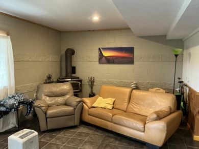 Experience luxury and serenity with this beautifully appointed 3 on Eagle Ridge Golf Course in Michigan - for sale on GolfHomes.com, golf home, golf lot