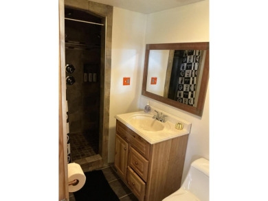 Experience luxury and serenity with this beautifully appointed 3 on Eagle Ridge Golf Course in Michigan - for sale on GolfHomes.com, golf home, golf lot