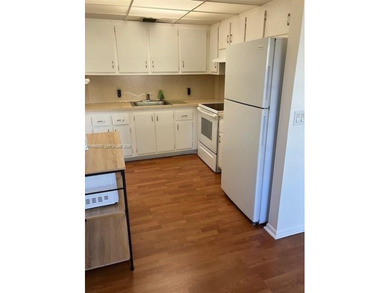 CHARMING 2BR 1.5 BA APARTMENT WITH RELAXING POOL & GARDEN VIEW on Flamingo Lakes Country Club in Florida - for sale on GolfHomes.com, golf home, golf lot