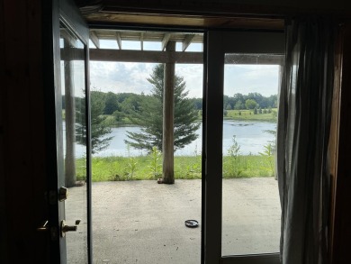 Experience luxury and serenity with this beautifully appointed 3 on Eagle Ridge Golf Course in Michigan - for sale on GolfHomes.com, golf home, golf lot