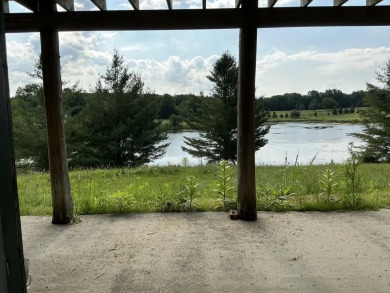 Experience luxury and serenity with this beautifully appointed 3 on Eagle Ridge Golf Course in Michigan - for sale on GolfHomes.com, golf home, golf lot