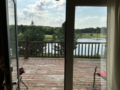 Experience luxury and serenity with this beautifully appointed 3 on Eagle Ridge Golf Course in Michigan - for sale on GolfHomes.com, golf home, golf lot