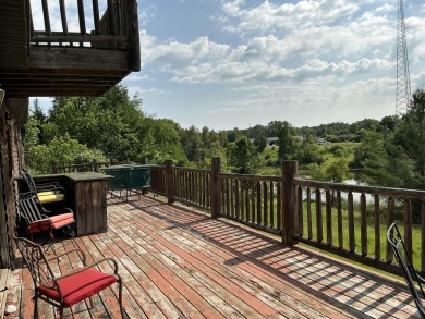 Experience luxury and serenity with this beautifully appointed 3 on Eagle Ridge Golf Course in Michigan - for sale on GolfHomes.com, golf home, golf lot