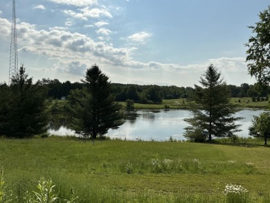 Experience luxury and serenity with this beautifully appointed 3 on Eagle Ridge Golf Course in Michigan - for sale on GolfHomes.com, golf home, golf lot
