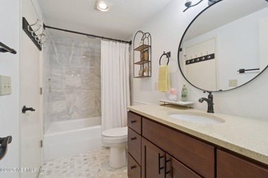 Enjoy low-maintenance living in this beautifully updated on The Deerwood Country Club in Florida - for sale on GolfHomes.com, golf home, golf lot