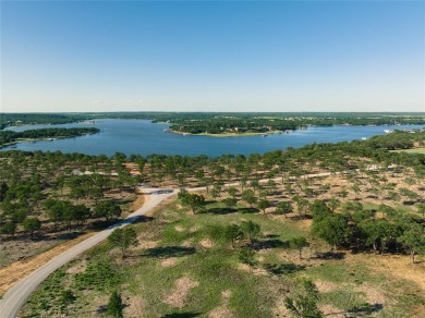 Enjoy 2.0 acres of lakeside tranquility tucked away in a cove on Twisted Oaks Golf Club in Texas - for sale on GolfHomes.com, golf home, golf lot