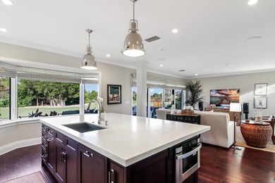 Upscale single-story estate located on the 16th hole of on  in Florida - for sale on GolfHomes.com, golf home, golf lot