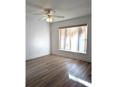 Under contract-accepting backup offers. Pride of ownership is on Mainlands Golf Club in Florida - for sale on GolfHomes.com, golf home, golf lot