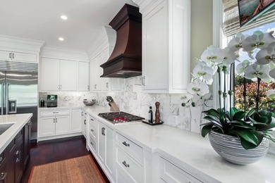 Upscale single-story estate located on the 16th hole of on  in Florida - for sale on GolfHomes.com, golf home, golf lot