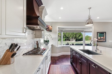 Upscale single-story home located on the 16th hole of on Jupiter Hills Club in Florida - for sale on GolfHomes.com, golf home, golf lot