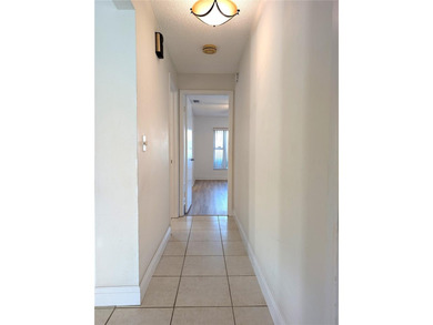 Under contract-accepting backup offers. Pride of ownership is on Mainlands Golf Club in Florida - for sale on GolfHomes.com, golf home, golf lot