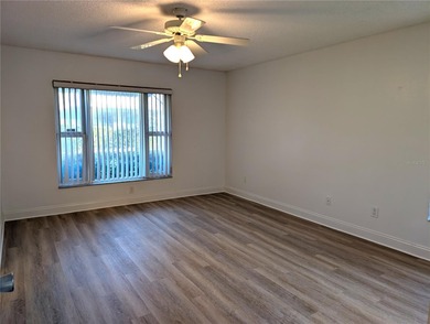 Under contract-accepting backup offers. Pride of ownership is on Mainlands Golf Club in Florida - for sale on GolfHomes.com, golf home, golf lot