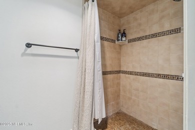 Enjoy low-maintenance living in this beautifully updated on The Deerwood Country Club in Florida - for sale on GolfHomes.com, golf home, golf lot