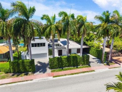 OVERSIZED WATERFRONT HOME WITH 80FT OF WATERFRONTAGE & GOLF on Miami Beach Golf Club in Florida - for sale on GolfHomes.com, golf home, golf lot