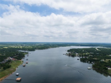 Enjoy 2.0 acres of lakeside tranquility tucked away in a cove on Twisted Oaks Golf Club in Texas - for sale on GolfHomes.com, golf home, golf lot