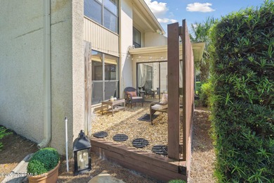 Enjoy low-maintenance living in this beautifully updated on The Deerwood Country Club in Florida - for sale on GolfHomes.com, golf home, golf lot