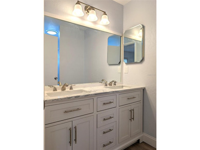 Under contract-accepting backup offers. Pride of ownership is on Mainlands Golf Club in Florida - for sale on GolfHomes.com, golf home, golf lot