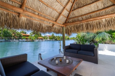 OVERSIZED WATERFRONT HOME WITH 80FT OF WATERFRONTAGE & GOLF on Miami Beach Golf Club in Florida - for sale on GolfHomes.com, golf home, golf lot