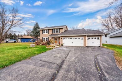 This stunning home is packed with updates and offers a lifestyle on Savannah Oaks Golf Club of Candlewick Lake in Illinois - for sale on GolfHomes.com, golf home, golf lot