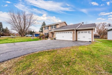 This stunning home is packed with updates and offers a lifestyle on Savannah Oaks Golf Club of Candlewick Lake in Illinois - for sale on GolfHomes.com, golf home, golf lot