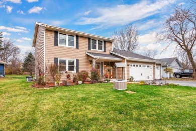 This stunning home is packed with updates and offers a lifestyle on Savannah Oaks Golf Club of Candlewick Lake in Illinois - for sale on GolfHomes.com, golf home, golf lot