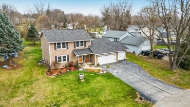 This stunning home is packed with updates and offers a lifestyle on Savannah Oaks Golf Club of Candlewick Lake in Illinois - for sale on GolfHomes.com, golf home, golf lot