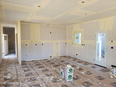 Charming 2-bedroom, 2-bath cottage nestled in a peaceful on Sandpoint Elks Golf Course in Idaho - for sale on GolfHomes.com, golf home, golf lot