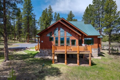 Tucked into the trees with unobstructed views of the Continental on Pole Creek Golf Club in Colorado - for sale on GolfHomes.com, golf home, golf lot
