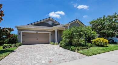 PARTIALLY FURNISHED 3-BEDROOM, 2-BATH POOL HOME IN GATED on Esplanade Golf and Country at Lakewood Ranch in Florida - for sale on GolfHomes.com, golf home, golf lot