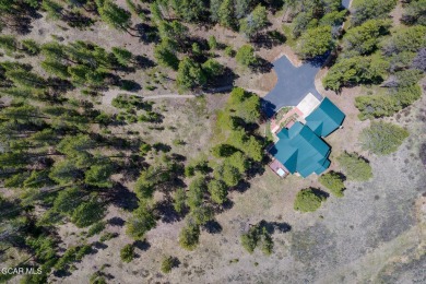 Tucked into the trees with unobstructed views of the Continental on Pole Creek Golf Club in Colorado - for sale on GolfHomes.com, golf home, golf lot