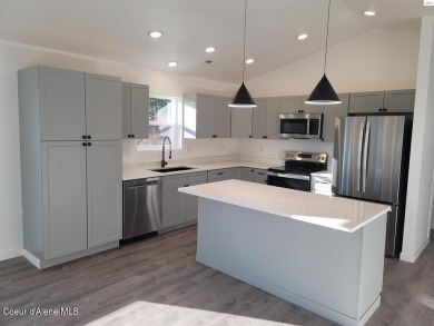 Charming 2-bedroom, 2-bath cottage nestled in a peaceful on Sandpoint Elks Golf Course in Idaho - for sale on GolfHomes.com, golf home, golf lot