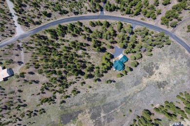 Tucked into the trees with unobstructed views of the Continental on Pole Creek Golf Club in Colorado - for sale on GolfHomes.com, golf home, golf lot
