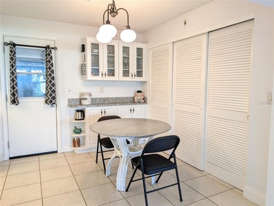 Under contract-accepting backup offers. Pride of ownership is on Mainlands Golf Club in Florida - for sale on GolfHomes.com, golf home, golf lot