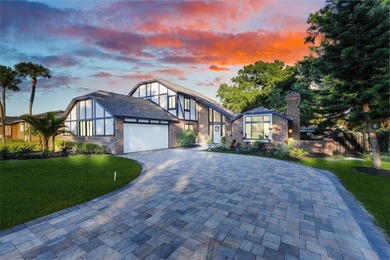 Not your cookie-cutter home.  This lovely Tudor offers character on Orange Tree Golf Club in Florida - for sale on GolfHomes.com, golf home, golf lot