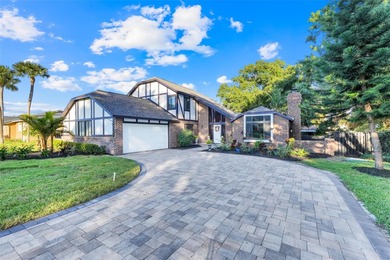 Not your cookie-cutter home.  This lovely Tudor offers character on Orange Tree Golf Club in Florida - for sale on GolfHomes.com, golf home, golf lot
